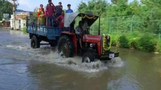Bengaluru Floods: Waterlogged Roads Force IT Employees To Commute Via Tractor To Reach Work | Video