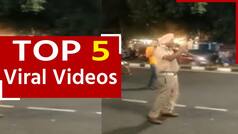 Viral Video: सिंगिंग कोप ने गाने के बोल के साथ दिए ट्रैफिक इन्स्ट्रक्शन कहा ‘गड्डी नु क्रैन ले गई बोलो ता रा रा रा...’। Watch Video