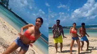 Nora Fatehi Oozes Oomph as She Grooves on a Mauritius Beach in Sexy Pink Bikini And Shorts - WATCH Viral Video