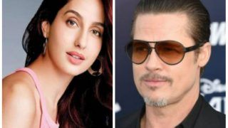Nora Fatehi Gets Brutally Trolled For Saying Brad Pitt 'Slid Into Her DMs'