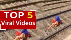 Viral Video:फोन पर बात करने के चक्कर में पटरी पर लेटी रही महिला, ट्रेन आई ऊपर से पार हो गई, आगे जो हुआ वह देखकर चौंक जाएंगे आप