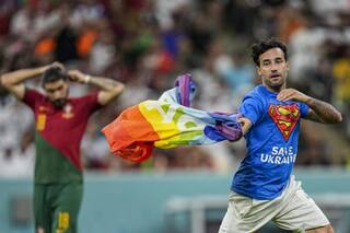 Protester With Rainbow Flag Runs Onto Field At FIFA World Cup