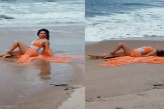 सनी लियोन ने ऑरेंज बिकिनी पहन बीच पर लेटकर करवाया फोटोशूट, वीडियो देख हो जाएंगे मदहोश