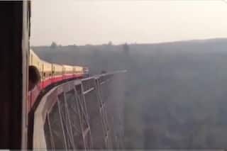 Viral: Train Passing Over Steep Cliff Makes Netizens Scared, Internet Calls It 'Terrifying'