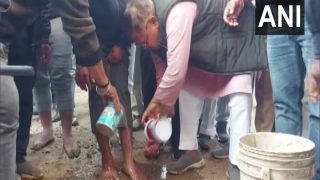 MP Minister Washes Feet Of Youth Covered With Mud To Apologise For Bad Condition Of Roads In Gwalior