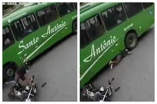 Viral Video: Biker Skids Under Moving Bus With Head Under The Wheel, Escapes Certain Death | Watch