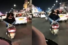 Viral: लखनऊ में स्कूटी पर रोमांस करता नजर आया कपल, अब तलाश में जुटी पुलिस