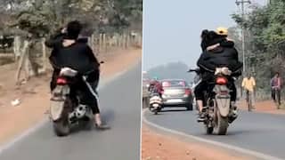 Couple Arrested for Hugging & Kissing While Riding Stolen Motorcycle, Video Goes Viral