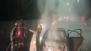 Car Catches Fire Near Mahamaya Flyover in Noida, Fire Tenders Rush to Spot | Watch