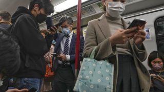 Hong Kong Lifts COVID Mask Mandate Imposed During Pandemic