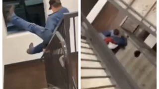 Man Tries To Slide Down Railing, Lands Down One Floor Below As Stunt Goes Horribly Wrong | Shocking Video Goes Viral