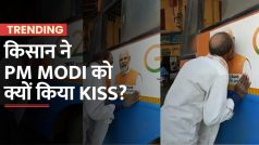 PM Modi के लिए उमड़ा किसान का प्यार, फोटो देखते साथ करने लगा KISS | Watch Video