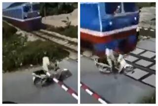 Man Tries To Cross Rail Crossing On Red Light, Lucky To Survive In One Piece: Watch