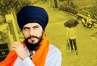 Watch: Amritpal Last Spotted in Haryana   s Kurukshetra, Uses Umbrella To Hide Face From CCTV