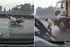 Biker Falls On Road, Speeding Truck Behind Him, Watch How He Is Saved