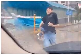 Boy Covers Baby Sister With Tee To Protect Her From Rain: Watch