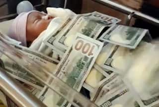 Man Showers, Covers His Newborn With High-Value Currency Notes: Watch