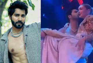 Varun Dhawan Responds to Trolls For Lifting & Kissing Gigi Hadid on Stage