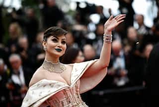Urvashi Makes Eyes Pop in Blue Lipstick at Cannes 2023 - D  j   Vu, Anyone?