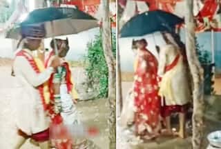 Bride Groom Video: मंडप में जाते ही पड़ने लगे ओले, सब भाग गए मगर फेरे लेते रहे दूल्हा-दुल्हन। वीडियो वायरल