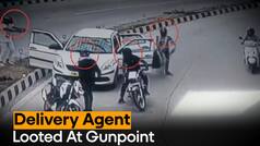 Caught On Cam: Miscreants Rob Delivery Agent And His Associate At Gunpoint - WATCH