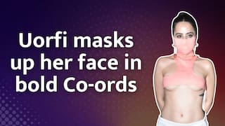 Uorfi Javed Masks Her Face Up In a Bold Peach Colored Co-Ord Set - Watch Video