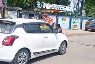 Madhya Pradesh Shocker: Woman Dragged On Car's Bonnet By Cops While Trying To Rescue Son; 3 Policemen Suspended | Watch