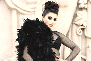 Urvashi Turns 'Black Crow' in Black See-Through Net Dress at PFW  2023, Netizens React