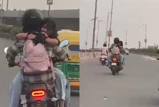 Couple Ka Video: चलती बाइक पर ही रोमांस करने लगा कपल, लोगों ने जो देखा उड़ गए होश | देखें वीडियो