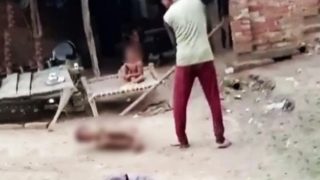 UP Man Ties Up And Thrashes 10-Yr-Old Son With Sticks For Skipping School; Detained After Video Goes Viral | Watch