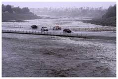 Rain From Tropical Storm Hilary Lashes California And Mexico, Swamping Roads And Trapping Cars