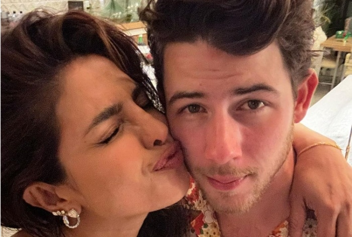 Priyanka Chopra and Nick Jonas wedding photos: The couple seal their love  with a kiss