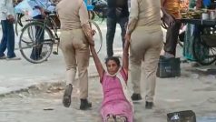 Shocking Video: यूपी पुलिस की शर्मनाक हरकत! दिव्यांग महिला को सड़क पर घसीटने का वीडियो वायरल, जानें क्या है वजह