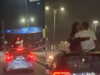 Couple Kissing Video: लड़के-लड़की की अश्लील हरकत, देखें कैसे चलती कार के रूफटॉप पर एक-दूसरे को किया बार-बार Lip Kiss