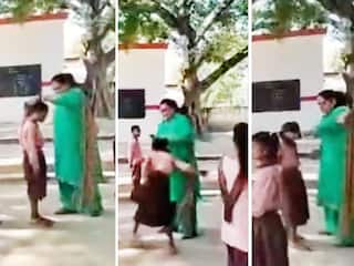 School Ka Video: छात्रा के बाल पकड़कर पीटने लगी टीचर, विरोध करने वाले को दे डाली चप्पल से कूटने की धमकी | देखें वीडियो