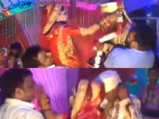 OMG Video: स्टेज पर गैर आदमी ने दुल्हन को गोद में उठाया तो पड़ गया जोरदार थप्पड़, आगे जो हुआ वो देखकर को रह जाएंगे हक्के-बक्के