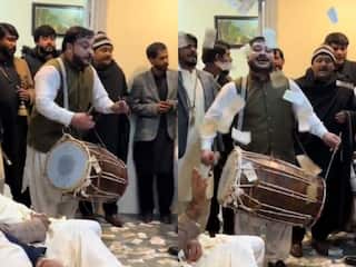 Viral Video Today: पाकिस्तान में ढोल पर बजा 'टिप टिप बरसा पानी' सॉन्ग, सुनते ही नोट उड़ाने लगे लोग | देखें वीडियो