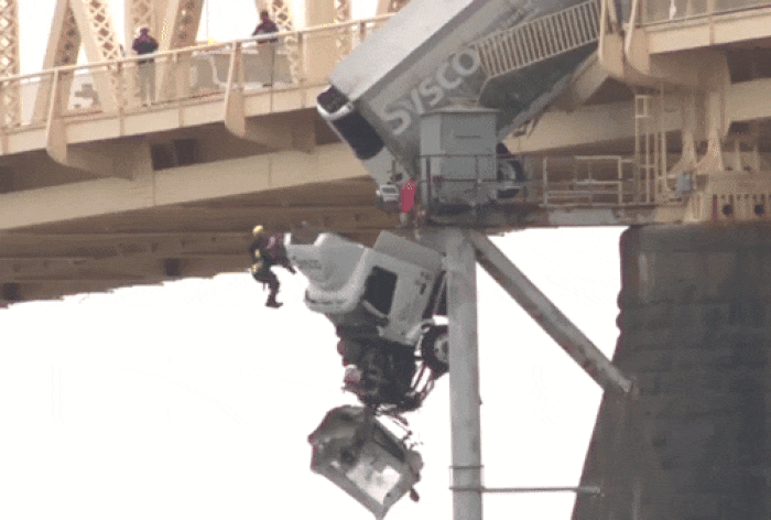 Dramatic Video: Woman Pulled From Truck Hanging Off Bridge In US After Accident