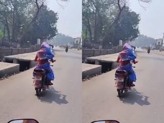 बाइक पर फर्राटे भर रही थी महिला, मगर पास जाते ही दिया 440 वोल्ट का झटका | देखें वीडियो