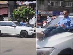 Pune Rerun?: Kalyan Teen Drives Dad's BMW Without License With Man On Bonnet | WATCH