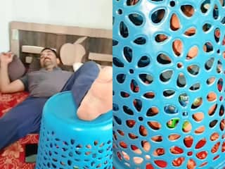 Funny Video: जालीदार बाल्टी में बच्ची को कैद करके पिता सोता रहा, देखकर लोग हैरान रह गए