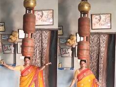 Dance Ka Video: सिर पर दो-दो सिलेंडर रखकर नाचने लगी महिला, आगे जो हुआ यकीन नहीं होगा | देखें वीडियो