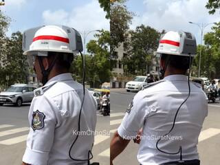 Viral Video: चिलचिलाती धूप में AC हेलमेट पहनकर निकला ट्रैफिक पुलिसकर्मी, सूरत में दिखा गजब का नजारा | देखें वीडियो