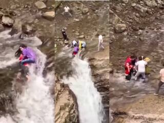 Viral Video Today: झरने से फिसलकर गिरने लगा भाई, मगर बहन ने बचाकर ही दम लिया | देखें वीडियो