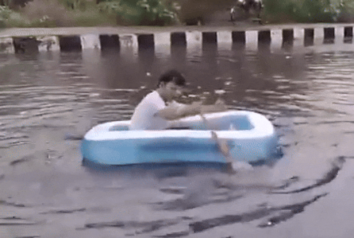 WATCH: BJP Councillor Stages Dramatic 'Boat Protest' Against AAP As Delhi Faces Severe Waterlogging Amid Rains