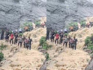 Viral Video: अंजनेरी वाटरफॉल का लुत्फ उठाने आए थे पर्यटक, मगर आफत में पड़ गई जान | देखें वीडियो