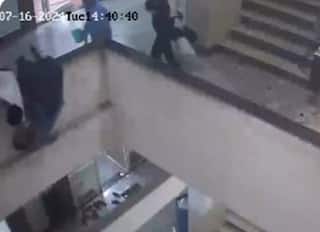 Caught On Camera: Woman Fell From 3rd Floor While Joking With Friend & Sitting On Staircase Wall