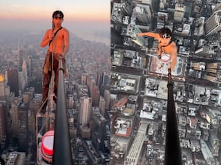 Viral Video Today: शख्स ने आसमान छूती इमारत की टॉप से ली सेल्फी, नजारा ऐसा आंखें फटी रह जाएंगी | देखें वीडियो