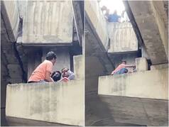 Watch: Noida woman gets stuck on pillar of elevated flyover after car rams her Scooty, rescued