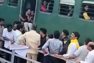 WATCH: Close Call For Andhra CM Naidu As Speeding Train Whizzes By During Flood Survey In Vijayawada